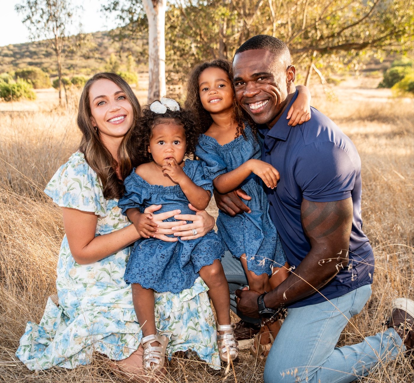 Raphael Akobundu with his wife and two daughters